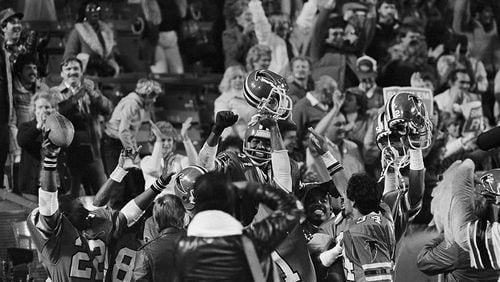 A "Big Ben" desperation pass caught by Willy "White Shoes" Johnson gave the Atlanta Falcons a victory over the San Francisco 49ers and a ride atop teammates' shoulders for Johnson in Atlanta, Nov. 21, 1983. The pass from Steve Bartkowski in the final two seconds won, 28-24. (Charles Kelly/AP)