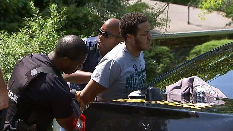 Police detained a man in connection with a shooting that left two people dead on Wed., May 25, 2016. (Credit: Channel 2 Action News)