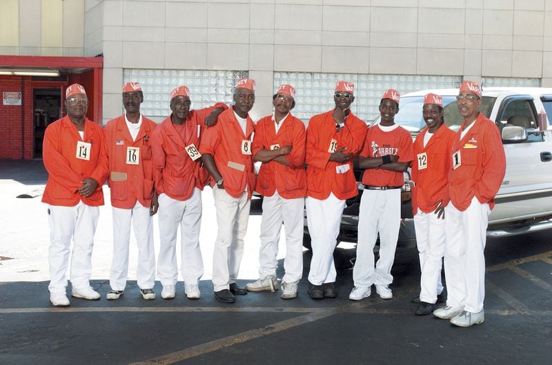 Louis Frank Jones (far right) poses with other Varsity carhops in 2003. CONTRIBUTED BY THE VARSITY