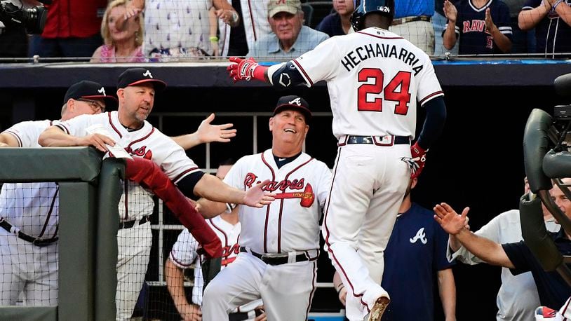 Adeiny Hechavarria #24 of the Atlanta Braves celebrates hitting a 2-run home run in the second inning against the Miami Marlins at SunTrust Park on August 21, 2019 in Atlanta, Georgia. (Photo by Logan Riely/Getty Images)
