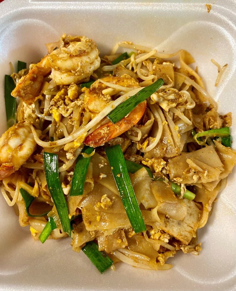 Two Fish Myanmar Cuisine in Clarkston makes an impeccable version of char kway teow, a stir-fry of wide rice noodles with shrimp. Wendell Brock for The Atlanta Journal-Constitution