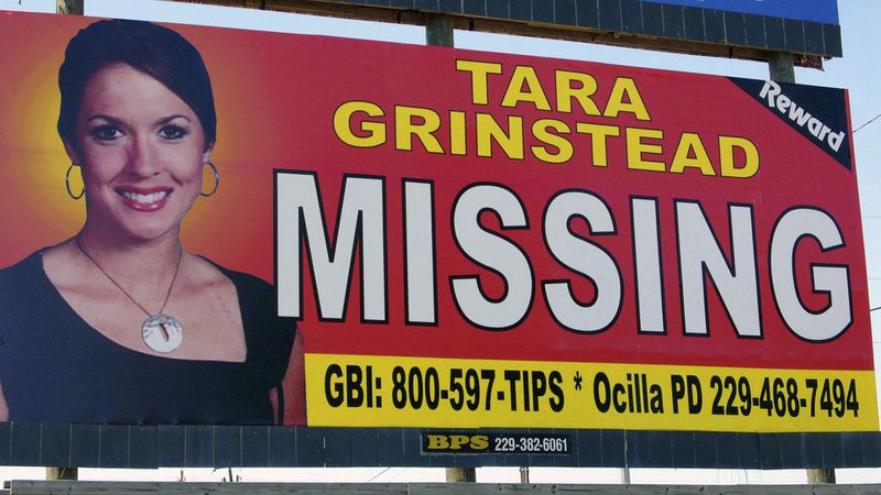In this Oct. 4, 2006, photo, teacher Tara Grinstead is displayed on a billboard in Ocilla, Georgia. Publicity surrounding the case and the community’s involvement in the search for her may make it difficult to seat an impartial jury. 