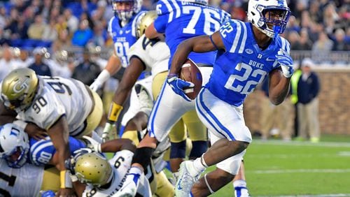 DURHAM, NC - NOVEMBER 18:  Brittain Brown #22 of the Duke Blue Devils scores a touchdown against the Georgia Tech Yellow Jackets during their game at Wallace Wade Stadium on November 18, 2017 in Durham, North Carolina.  (Photo by Grant Halverson/Getty Images)