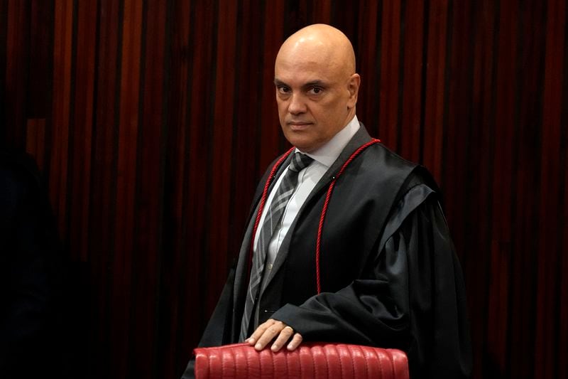 FILE - Brazilian Supreme Court Chief Justice Alexandre de Moraes, arrives to in Brasilia, Brazil, June 22, 2023. The Republican-controlled House Judiciary Committee published a staff report on Wednesday, April 18, 2024, disclosing dozens of decisions by Moraes, ordering Elon Musk's X to suspend or remove around 150 user profiles from its platform in recent years. (AP Photo/Eraldo Peres, File)