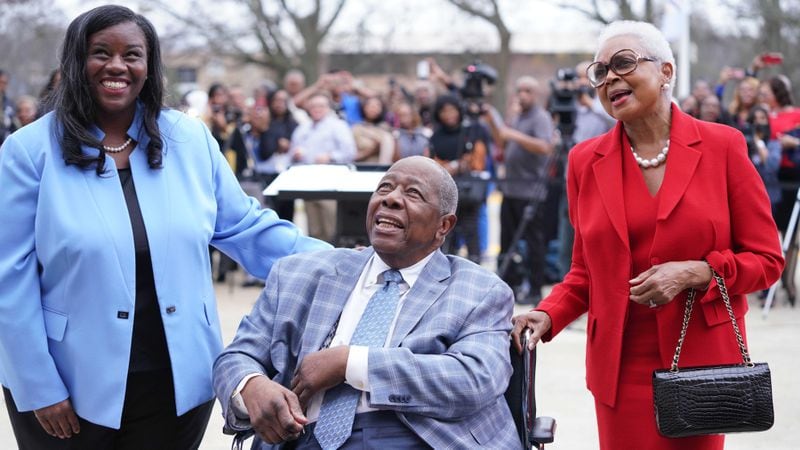 From left to right: Atlanta Technical College President Victoria Seals, Hank Aaron and his wife, Billye Aaron, watch as the school renames its academic complex after him in February 2020. The couple donated several million dollars for student scholarships and endowments. (Courtesy of Atlanta Technical College)