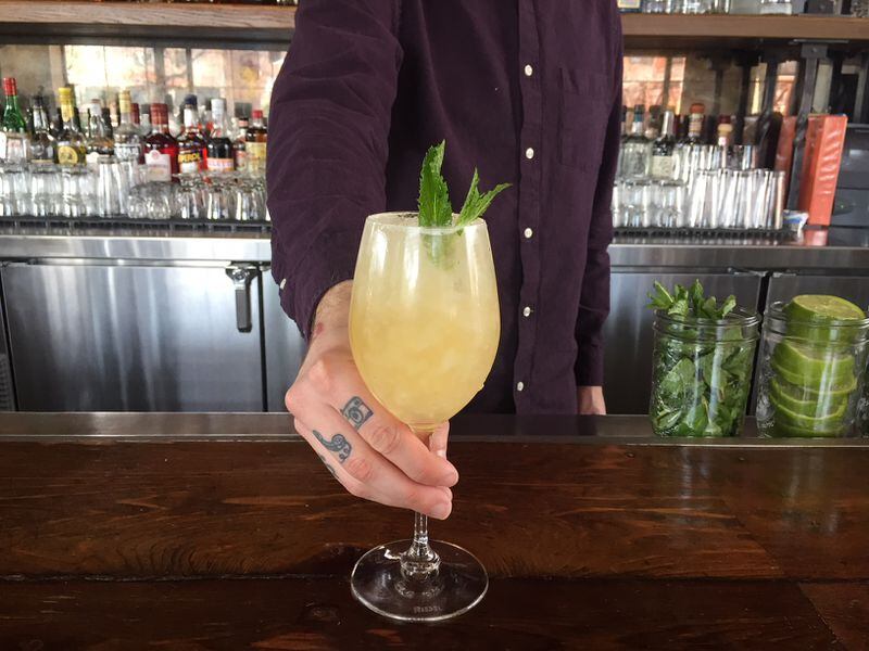  The Photo Finish at JCT adds a spritz of sparkling wine to a traditional julep. Courtesy JCT Kitchen & Bar