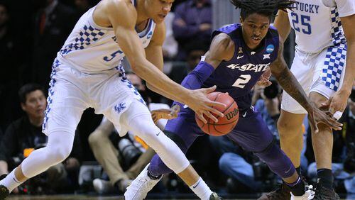 Kentucky forward Kevin Knox steals from Kansas State guard Cartier Diarra during the first half in a regional semifinal NCAA college basketball game on Thursday in Philips Arena.