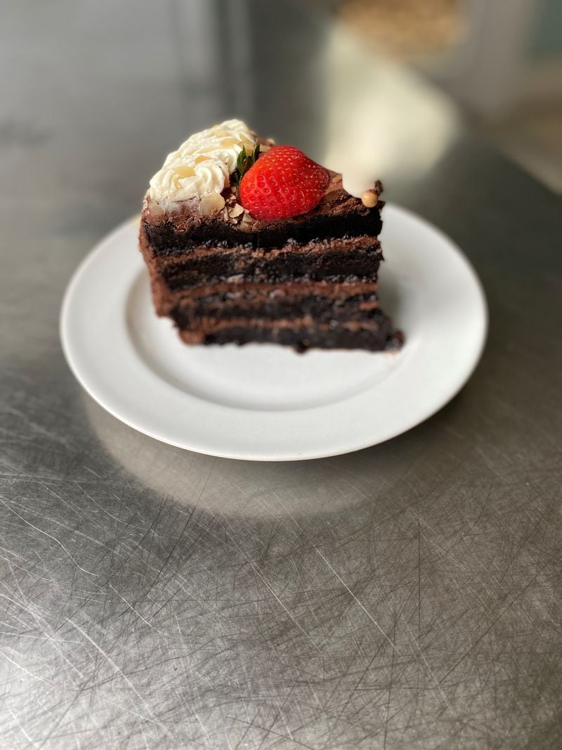Joy Cafe offers chocolate-caramel cake for dessert. Wendell Brock for The Atlanta Journal-Constitution