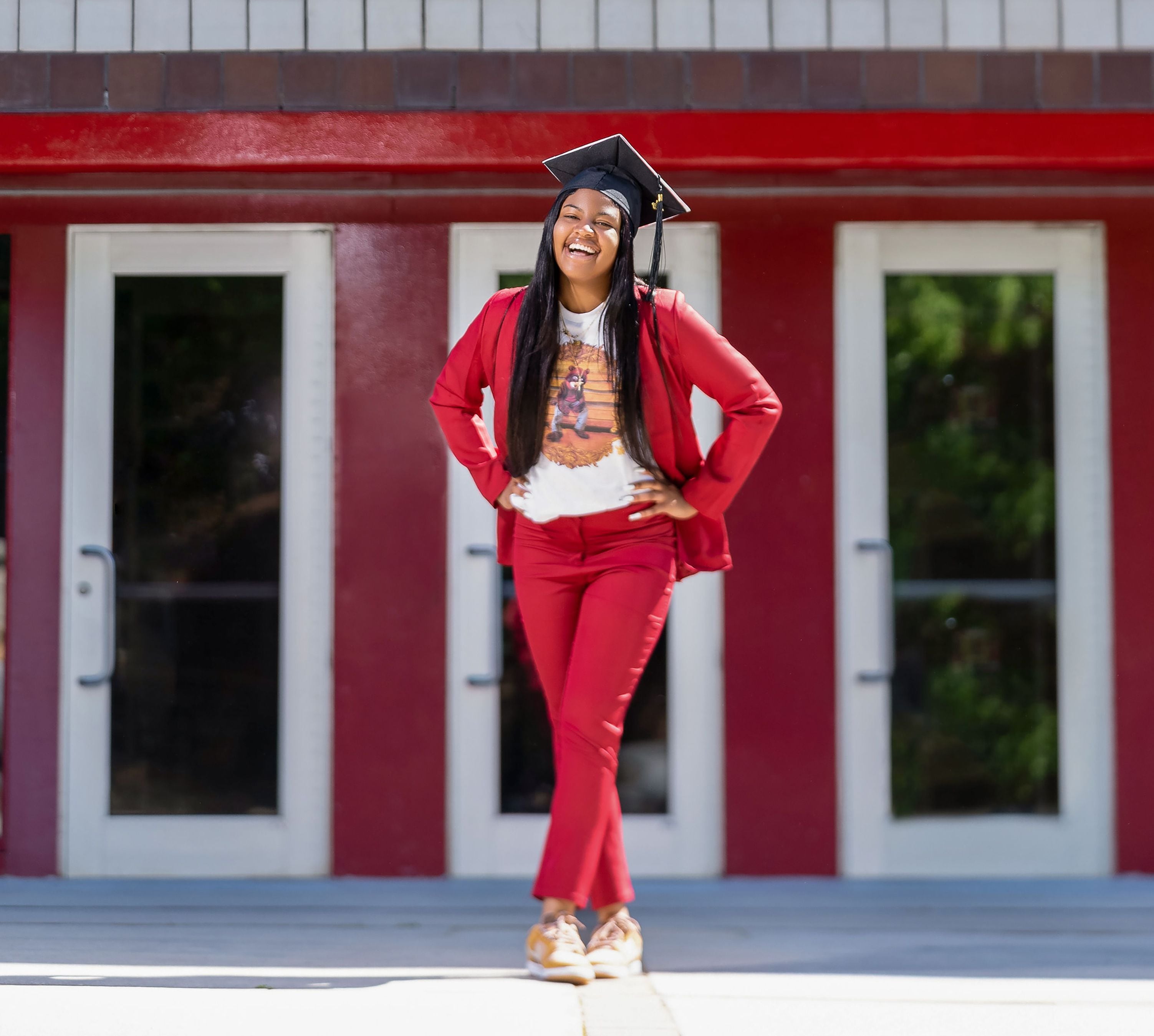 Photo of AJC intern Kiana Stevenson in graduate cap