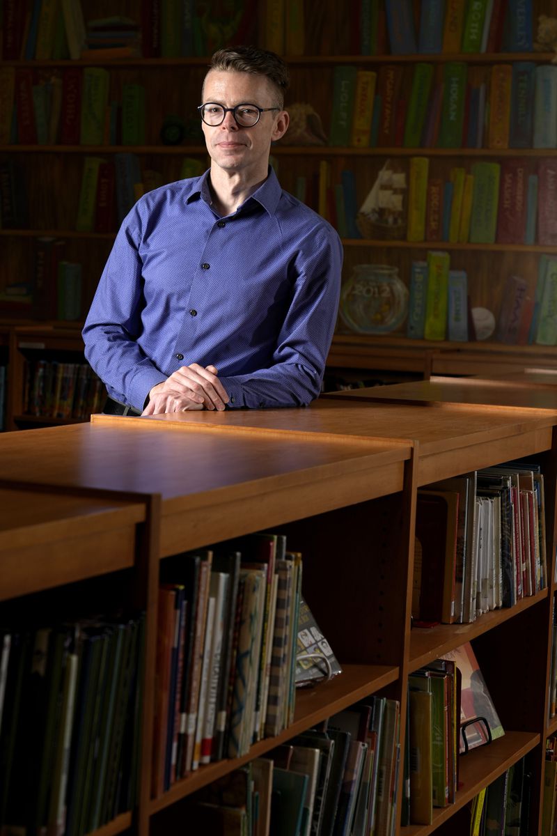 Tom Bober, librarian and President of the Missouri Association of School Librarians, poses for a photo Wednesday, March 20, 2024, in Clayton, Mo. (AP Photo/Jeff Roberson)