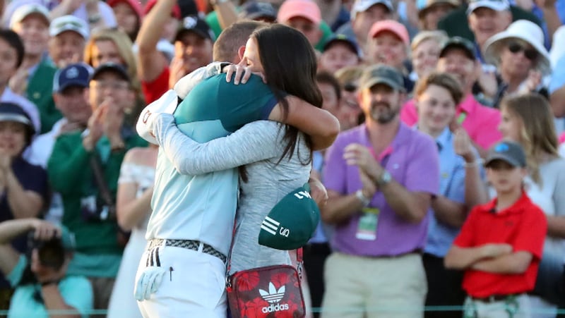 April 9, 2017 AUGUSTA Sergio Garcia celebrates with his fiancee, Angela Akins after winning the green jacket of a Masters champion following a one-hole playoff. Both he and Justin Rose finished their rounds at 9-under, forcing the playoff. Play begins in the final round of the 81st Masters tournament at the Augusta National Golf Club, Sunday, April 9, 2017. CURTIS COMPTON/ AJC