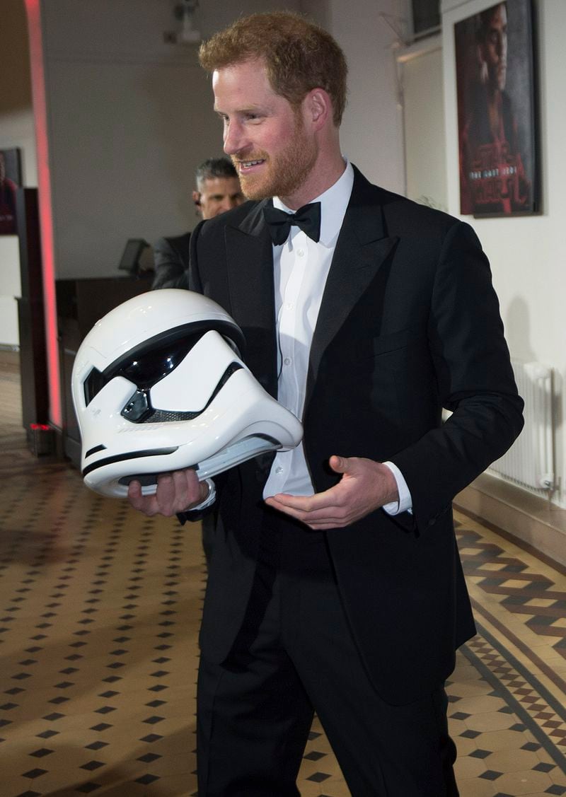 LONDON, ENGLAND - DECEMBER 12: Prince Harry is pictured with a Stormtroppers helmet as he attends the European Premiere of 'Star Wars: The Last Jedi' at Royal Albert Hall on December 12, 2017 in London, England.  (Photo by Eddie Mulholland - WPA Pool/Getty Images)