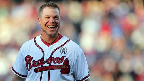 Chipper Jones delivers the ceremonial pitch before the Braves season opener against the Phillies April 2, 2013, at Turner Field in Atlanta.