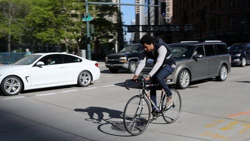 Bicyclists abound in Downtown Denver, which has special bike lanes and pathways to add to the transportation options. Ben Gray / bgray@ajc.com