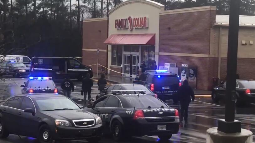Investigators learned that a man had walked into the store and pulled a gun on two employees.