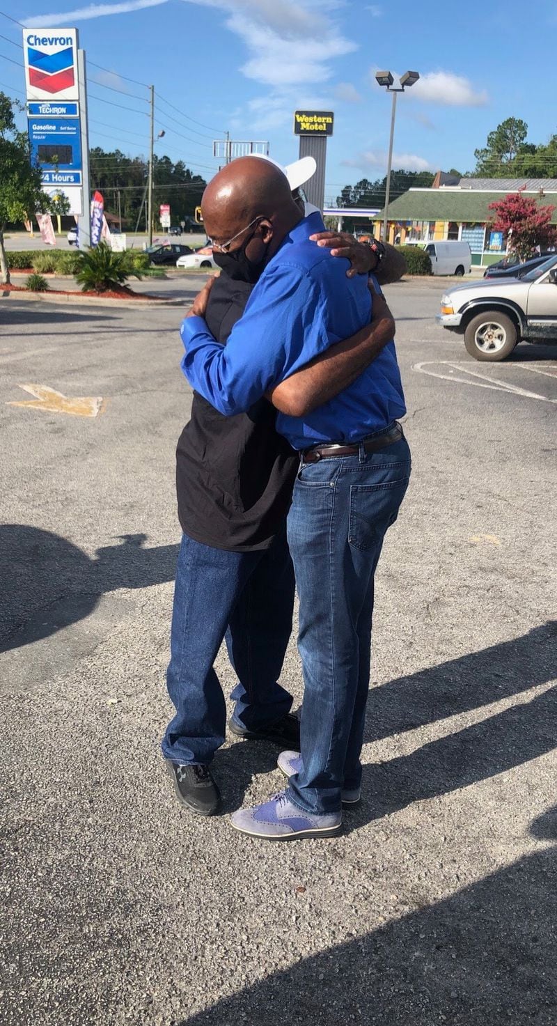 The Rev. Raphael Warnock and his brother Keith reunite.