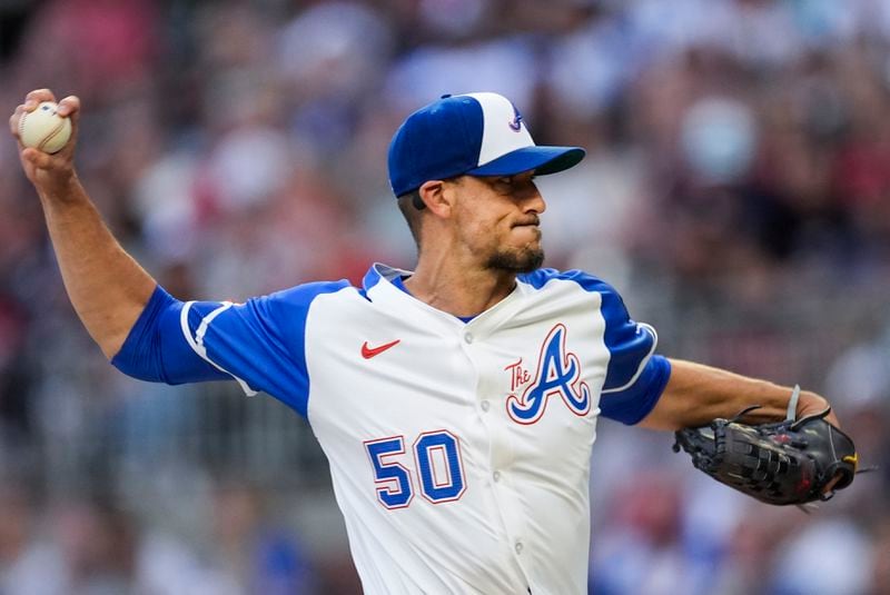 Atlanta Braves pitcher Charlie Morton delivers to a Texas Rangers batter in the first inning of a baseball game Saturday, April 20, 2024, in Atlanta. (AP Photo/John Bazemore)