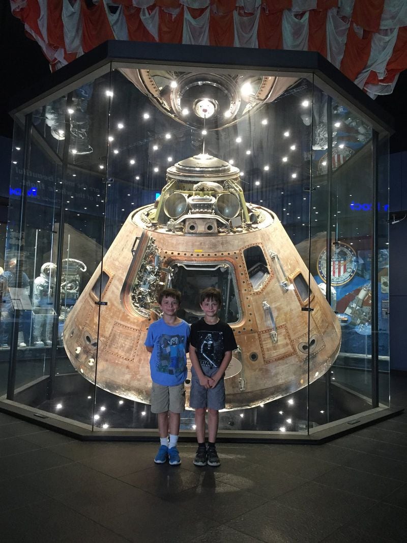 Sara Butler is planning to head to the Nashville area on Sunday with her twin boys, Jacob and Owen, who turn 9 in September. This photo of Owen (left) and Jacob was taken last year in front of the Apollo 16 Command Module on display at the U.S. Space and Rocket Center in Huntsville, Ala. CONTRIBUTED