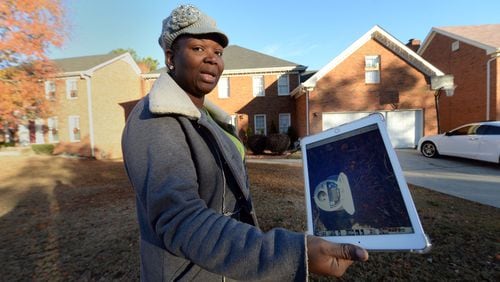 Rosemarie Thompson recently received a water bill for more than $1,500. She’s one of many people in DeKalb County facing inexplicable charges. She is shown at her Stone Mountain home Dec. 2. About 1 in 8 DeKalb water customers’ bills have tripled at least once since April 1, 2015. KENT D. JOHNSON/ AJC
