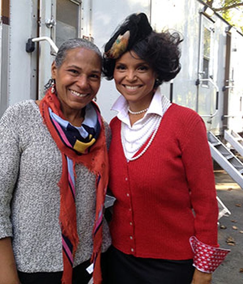 Evelyn Lavizzo, left, executive director of the Carrie Steele-Pitts Home, meets with Victoria Rowell on the set of “A Baby for Christmas,” filmed in Atlanta. (Photo courtesy of UP TV)