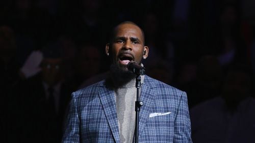 NEW YORK, NY - NOVEMBER 17:  Singer R. Kelly sings the National anthem before the Brooklyn Nets vs the Atlanta Hawks  at The Barclays Center on November 17, 2015 in New York City.