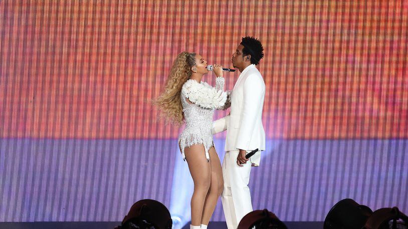 Beyonce and Jay-Z get close at the first of their two weekend concerts at Mercedes-Benz Stadium.