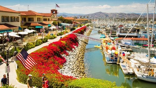 Stroll the waterside pathways that front boutiques, galleries and restaurants at Ventura Harbor Village Marina. CONTRIBUTED BY WWW.VISITVENTURACA.COM