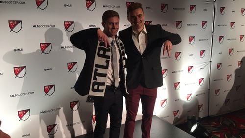 Atlanta United's Jon Gallagher, selected with the 14th pick in Friday's MLS SuperDraft, and Julian Gressel, the reigning MLS Rookie of the Year, pose in Philadelphia.