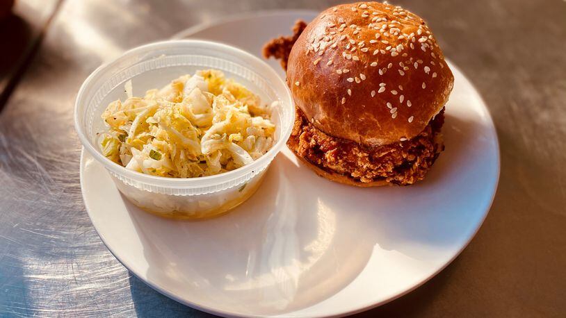 Hero Doughnuts & Buns serves a stellar fried chicken sandwich. It’s paired here with the crunchy slaw. Wendell Brock for The AJC