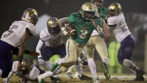 November 23, 2018 - Buford, Ga: Buford running back Derrian Brown (3) runs for a long gain in the first half against Bainbridge at Buford High School Friday, November 23, 2018, in Buford, Ga. This is the quarter finals of the Class 5A state playoffs. (JASON GETZ/SPECIAL TO THE AJC)