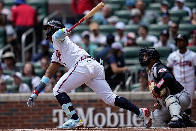Atlanta Braves' Ronald Acuña Jr. (13) flies out in the first inning of a baseball game against the Cleveland Guardians, Sunday, April 28, 2024, in Atlanta. (AP Photo/Mike Stewart)