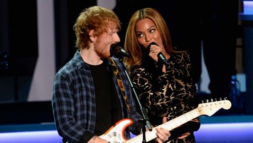 Ed Sheeran (L) and Beyonce teamed up for a duet version of Sheeran's song "Perfect."