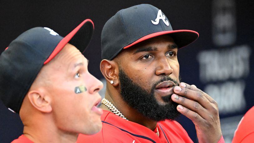 Braves' Marcell Ozuna (right) watches during the Atlanta Braves home game against Houston Astros at Truist Park on Friday, August 19, 2022. (Hyosub Shin / Hyosub.Shin@ajc.com)