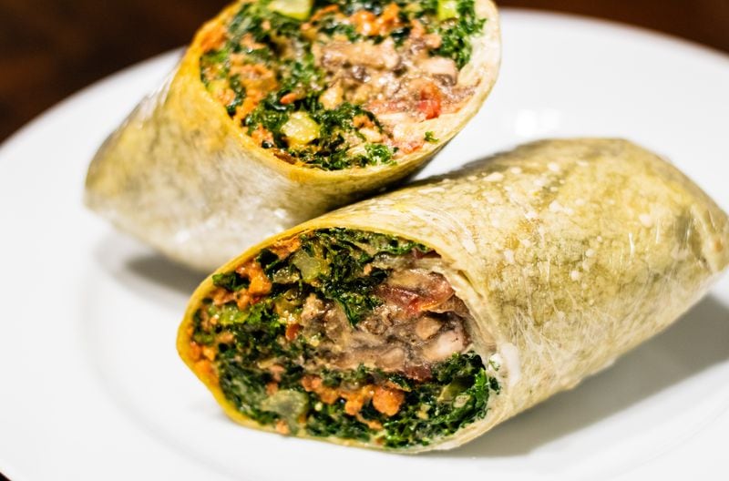 The Dat Ish Wrap from Tassili's Raw Reality is the size of a burrito and packs a heavy punch in terms of both flavor and satisfaction. CONTRIBUTED BY HENRI HOLLIS