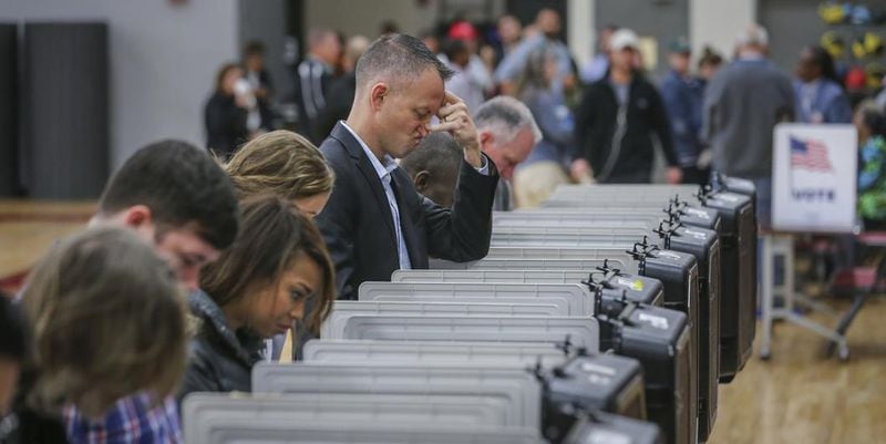 Georgia's outdated electronic voting machines will be replaced. (Photo: John Spink/The Atlanta Journal-Constitution)