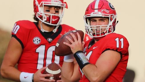 Georgia quarterback Jacob Eason looks on as Jake Fromm prepares to play Mississippi State Saturday, September 23, 2017, in Athens.   Curtis Compton/ccompton@ajc.com