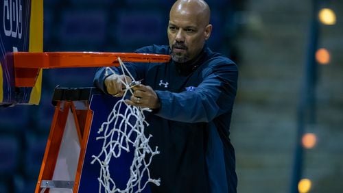 Georgia State coach Rob Lanier recently cut down the nets after the Panthers won the Sun Belt Championship game. Georgia State is looking for a new coach after Lanier was hired by Southern Methodist University on Sunday.