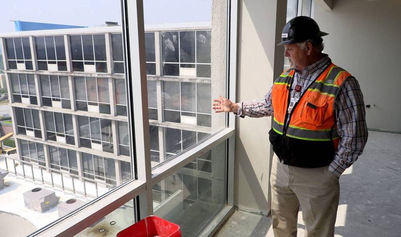 Taine Waller, director of construction at Piedmont Columbus Regional in Columbus, gives a tour of the Bill and Olivia Amos Children’s Hospital that’s under construction in Columbus, Georgia. (Photo Courtesy of Mike Haskey)
