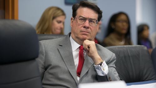 Sandy Springs Mayor Rusty Paul sits during a county meeting at the Fulton County Government Center, Monday, in 2015. The city recently started virtual conversations on race. BRANDEN CAMP/SPECIAL