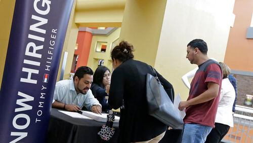 FILE - 40,000 jobs added in Metro Atlanta in May. The state has seen unemployment numbers dip as more people gain access to employment. (AP Photo/Alan Diaz, File)