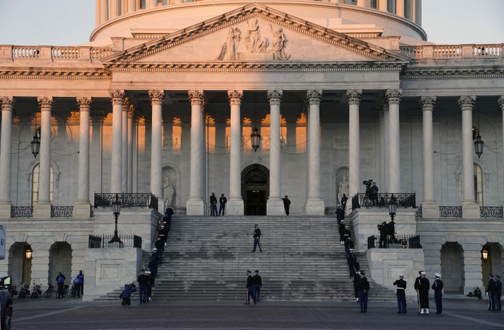 Military personnel gather at the U.S. Capitol in Washington on Wednesday morning, Jan. 20, 2021, hours before the presidential inauguration of Joe Biden. (Amr Alfiky/The New York Times)