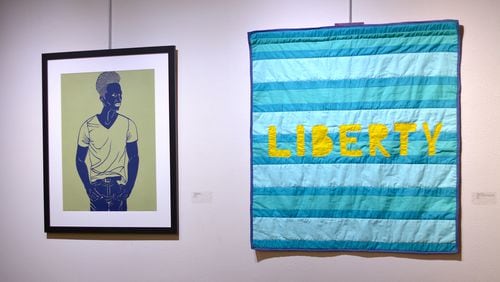 (left to right) Jerushia Graham's "From Where I Stand #3" papercut and "Freedom Isn't Free: Liberty" pieced and quilted cotton fabric.
Courtesy of Caroline Giddis