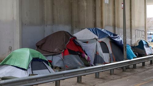 A homeless encampment is shown at Pryor Street under the I-20 overpass, Thursday, Feb. 22, 2024, in Atlanta. (Jason Getz / jason.getz@ajc.com)