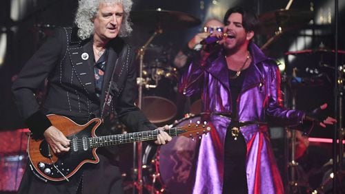 Guitarist Brian May (L) and singer Adam Lambert of Queen + Adam Lambert perform as the group kicks off its 10-date limited engagement, "The Crown Jewels," at Park Theater at Park MGM on September 1, 2018 in Las Vegas.