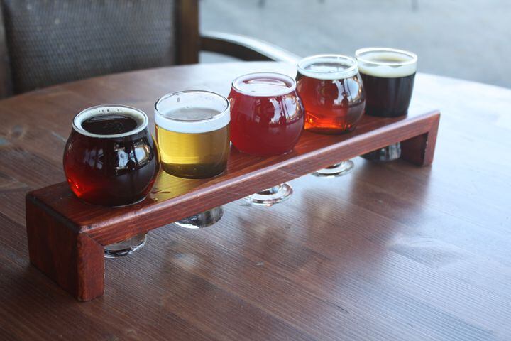 A flight of beers in the taproom at Cherry Street Brewing in Cumming. credit: Holly Steel / hsteel@ajc.com