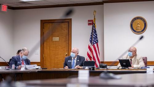 Georgia Senators John Wilkinson (R - Toccoa) (from left), Butch Miller (R - Gainesville) and Ellis Black (R - Valdosta) take part in a Senate appropriations subcommittee meeting . (ALYSSA POINTER / ALYSSA.POINTER@AJC.COM)
