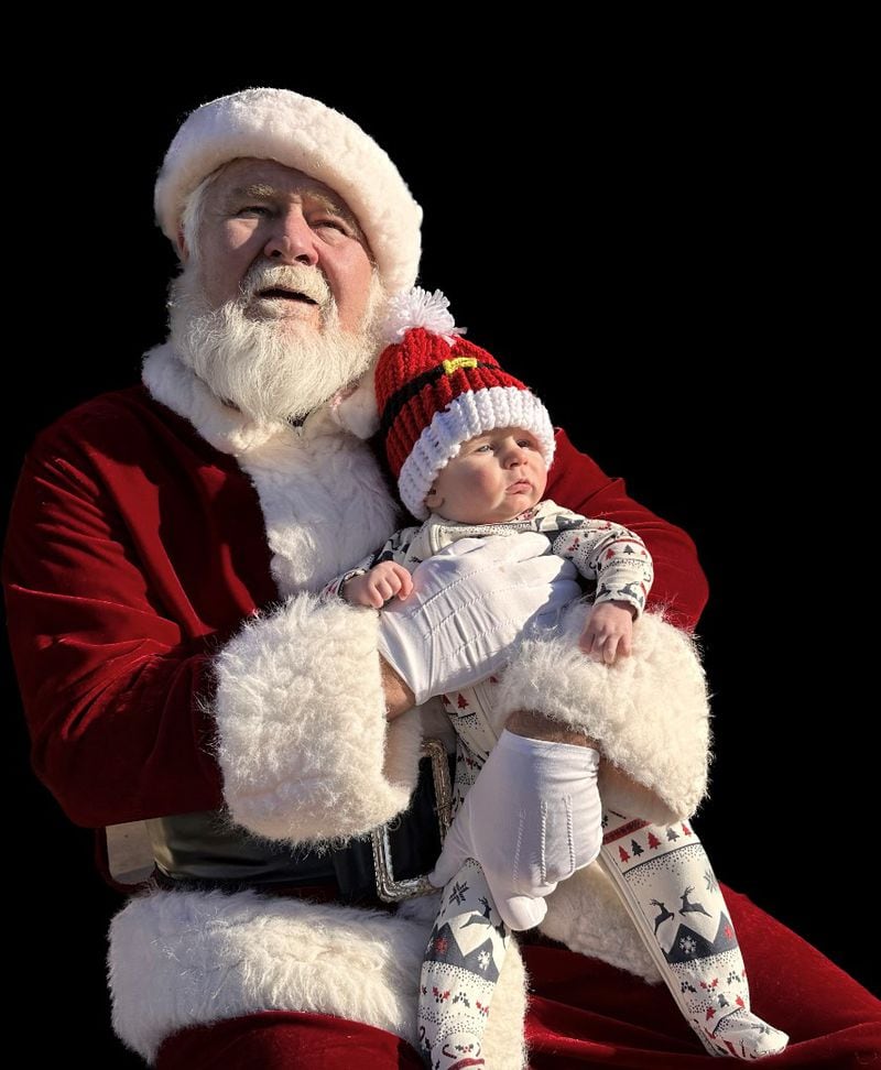 Grandson Hank spends some contemplative time with Santa.