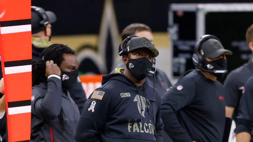 Falcons head coach Raheem Morris watches the action on the field Sunday, Nov. 22, 2020, against the Saints in New Orleans. Atlanta lost 24-9. (Tyler Kaufman/AP)