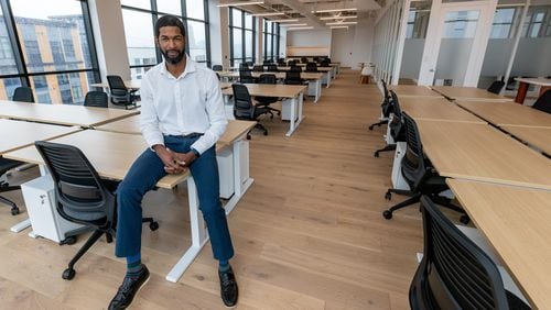 SVP Community and Assistant Manager Errol Williams poses for a photograph in one of the office spaces at the new Wework building in Atlanta Friday, Nov. 11, 2022.  (Steve Schaefer/steve.schaefer@ajc.com)
