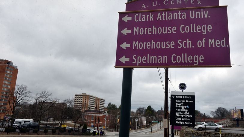 Signs point to the Atlanta University Center area along Martin Luther King Jr Drive.